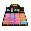 Cube Squeeze Glitter toys in pink, purple and orange shades inside a retail display